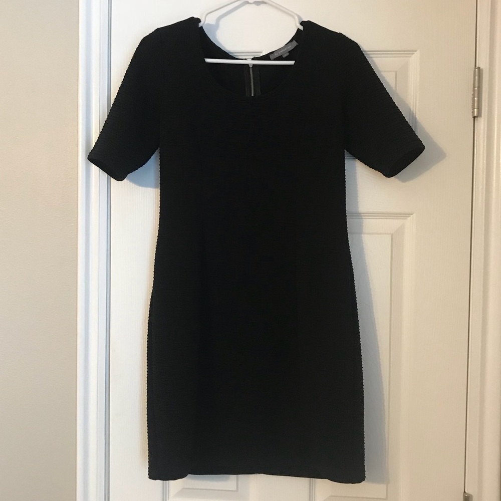 Ribbed form fitting black dress size Large
